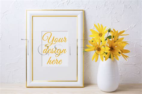 Download Landscape golden frame mockup with yellow rosinweed flowers.